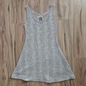 Grey knit chic textured sleeveless dress with a sheer nude colored liner